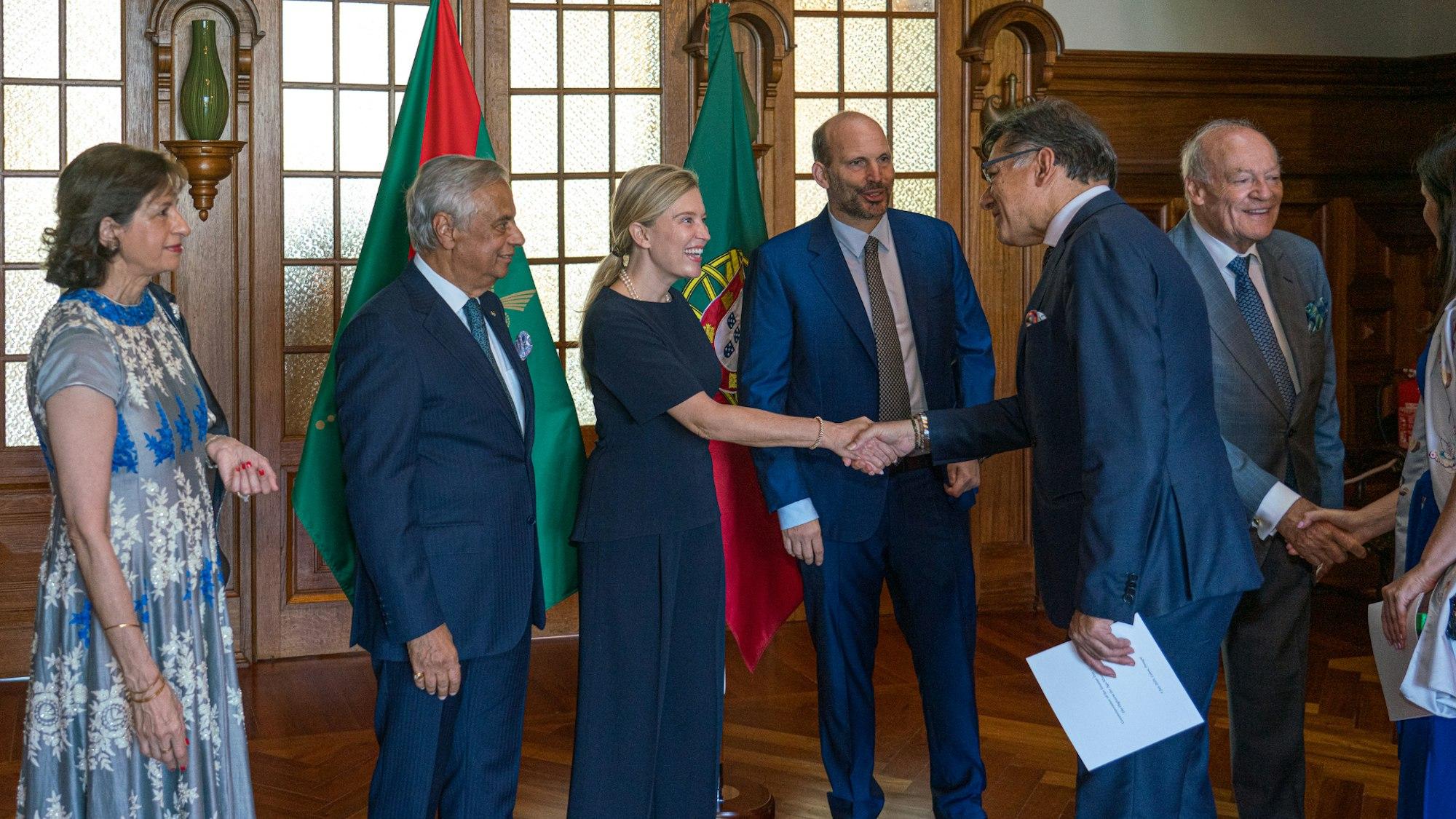 Members of His Highness the Aga Khan’s family welcome guests to the Imamat Day reception at the Diwan of the Ismaili Imamat in Lisbon.